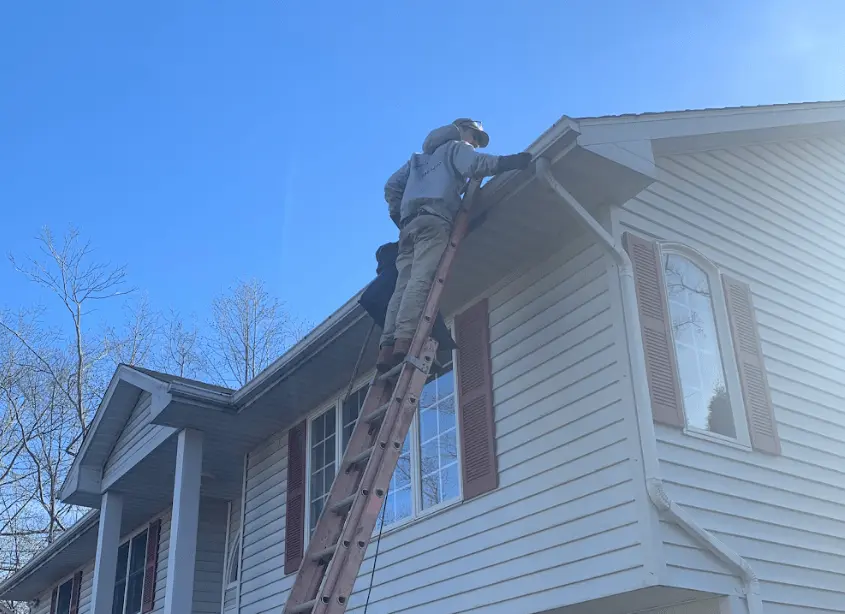 Gutter cleaning and maintenance being performed by Warrensville Heights Power Washing in Warrensville Heights